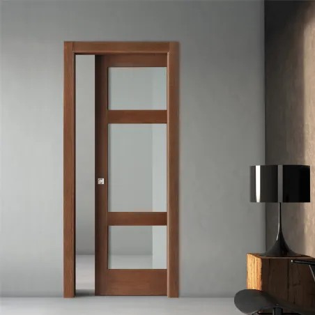 Pocket door of wood and glass