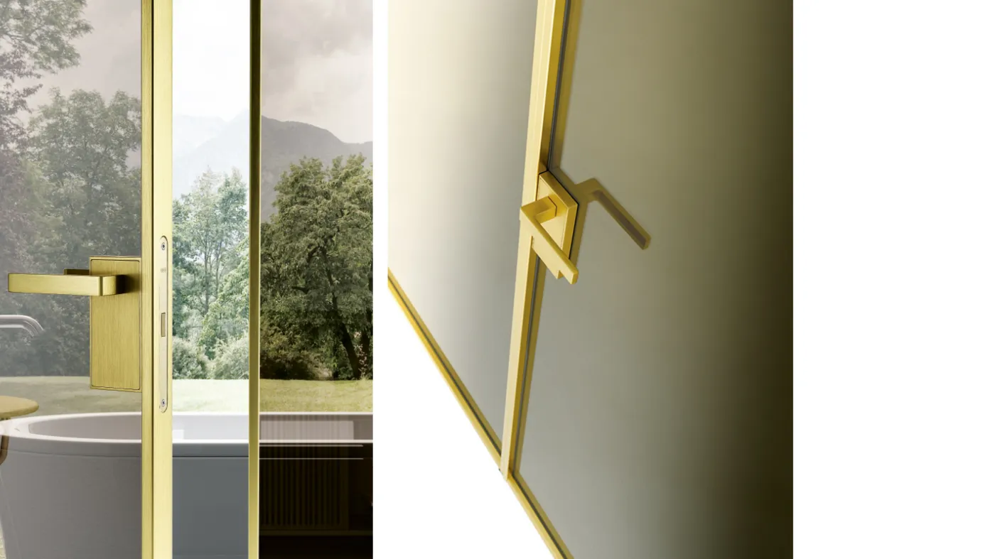 double hinged door gold finish aluminum and glass Bertolotto design Italian doors