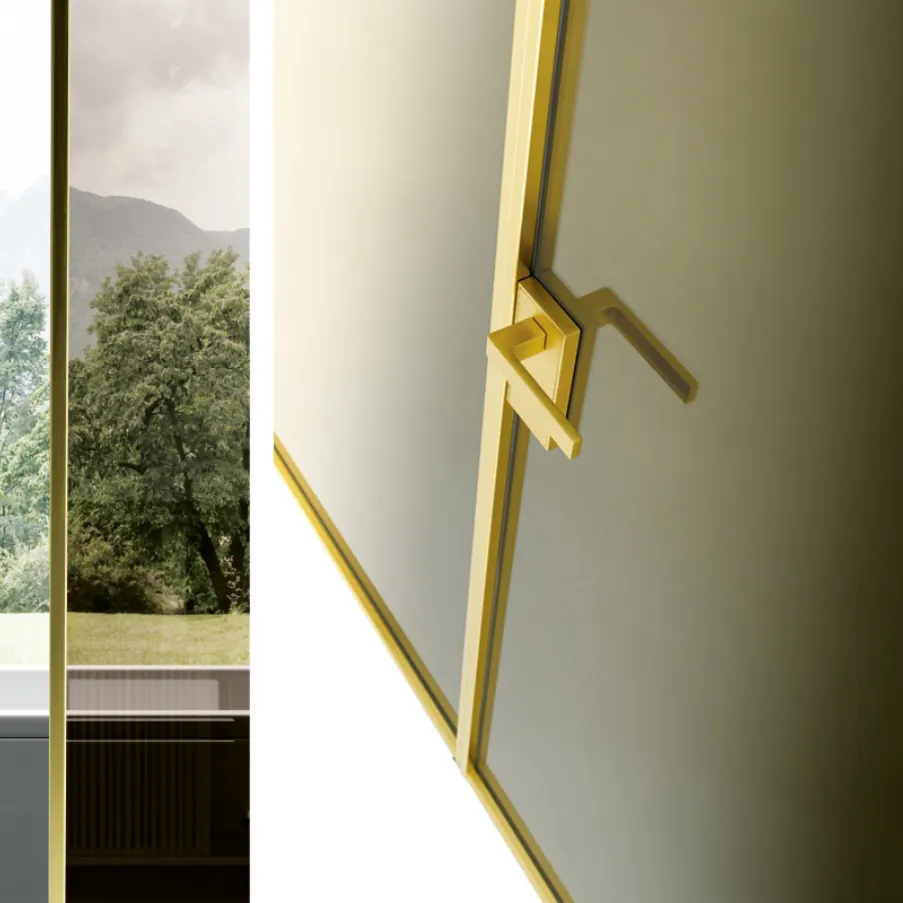 double hinged door gold finish aluminum and glass Bertolotto design Italian doors