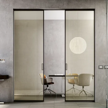 internal flush-to-the-wall sliding doors in glass and aluminum designed by Bertolotto Internal doors