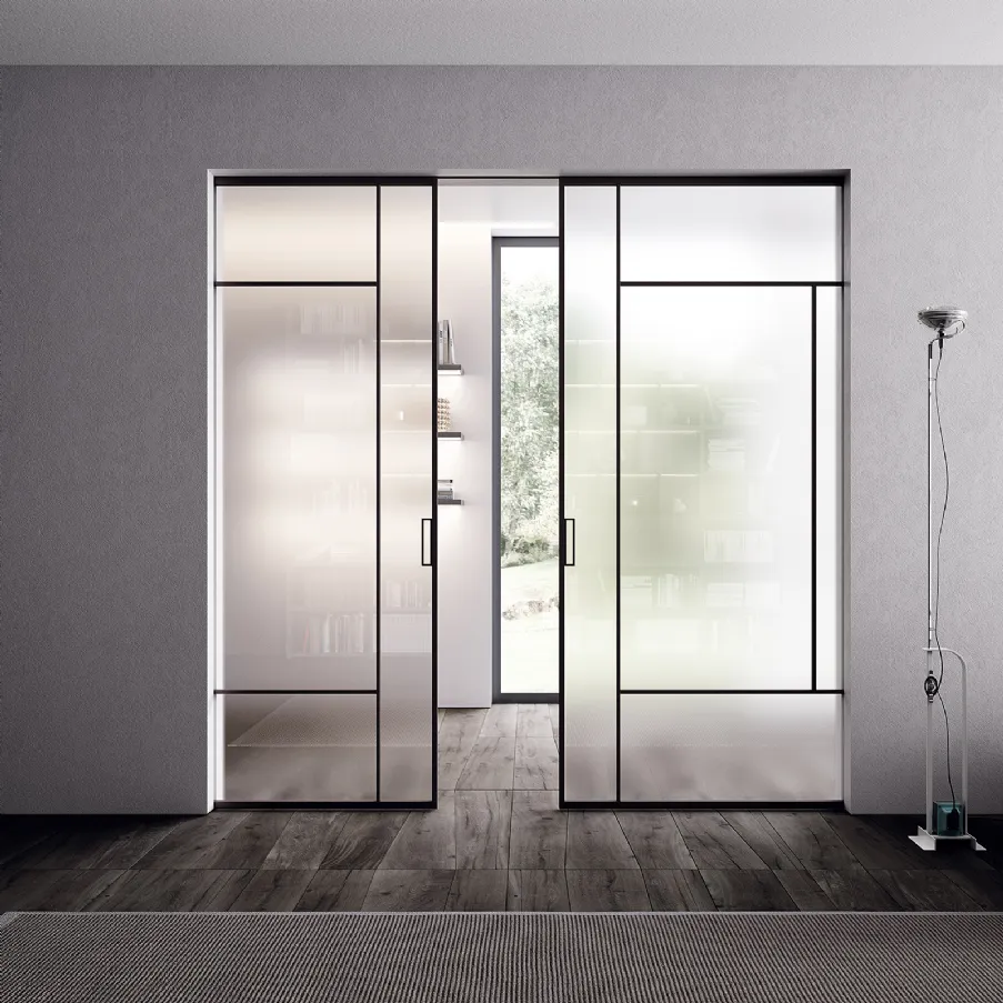 double wave sliding door in clear transparent glass design Bertolotto Internal doors made in Italy